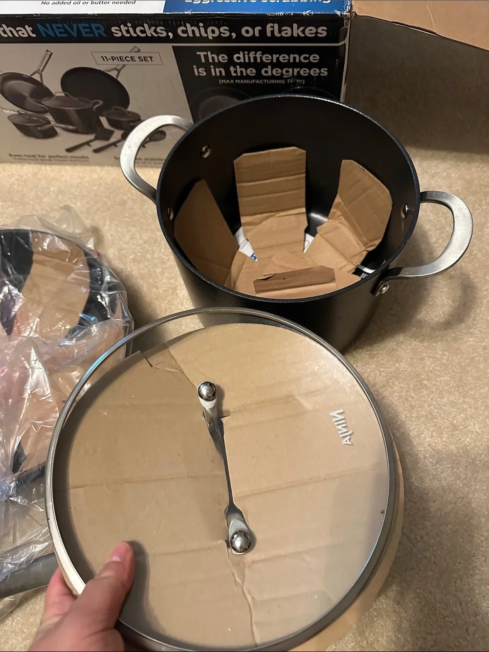 Ninja cookware set in black and stainless steel with glass lid